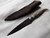 Antiqued antler handle patch knife with pewter bolster & embossed sheath