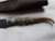 Antiqued antler handle patch knife with pewter bolster & embossed sheath