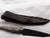 Antiqued antler handle patch knife with pewter bolster & embossed sheath