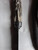 Antiqued antler handle patch knife with pewter bolster & embossed sheath