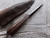 Walnut handle patch knife with checkering and dots