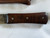 Large hand forged skinning knife with curly maple handle