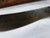 Large hand forged skinning knife with curly maple handle