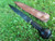 Cuttoe style longknife with hand carved effigy of a face
