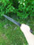 Cuttoe style longknife with hand carved effigy of a face