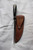 Broad bladed belt knife with horn handle and iron fittings