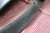 Large hand forged skinning knife with curly maple handle and riveted sheath