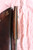 Large hand forged skinning knife with curly maple handle and riveted sheath
