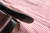 Hand forged skinning knife with curly maple handle and riveted sheath