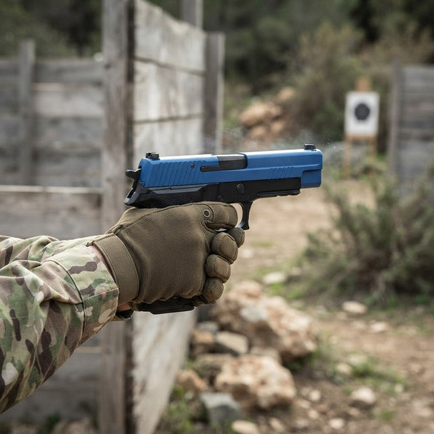 HFC HG175 Sig Sauer P226 Metal Gas Blowback Airsoft Pistol in Dual Tone Blue held toward a distant target