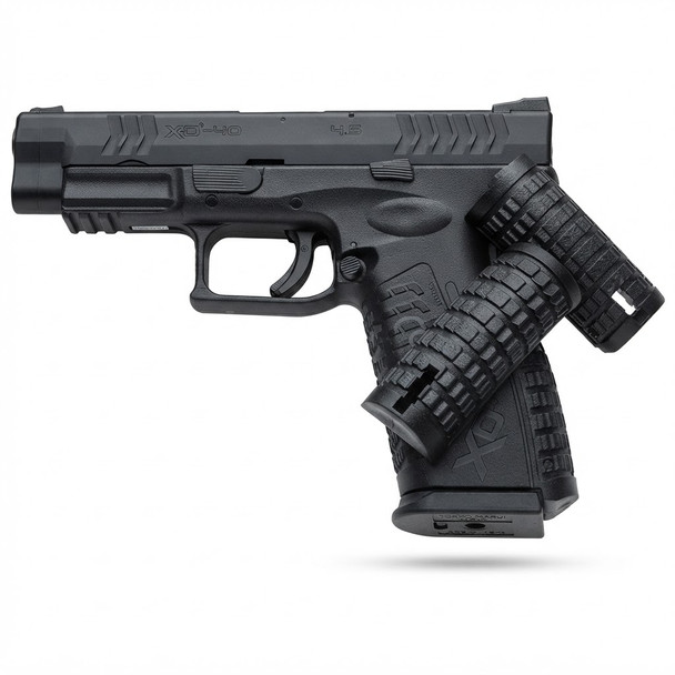 Tokyo Marui XDM-40 GBB Airsoft Pistol with detachable back straps resting against the textured grip.