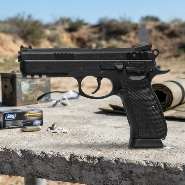 ASG CZ 75 SP-01 Shadow Co2 NBB Airsoft Pistol in Black positioned on a concrete surface in an outdoor shooting range.