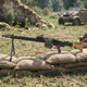 AGM MG42 WW2 Support Machine Gun (Full Metal) side view resting on sandbags with drum magazine and bipod