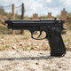 ASG M92 Non Blowback Gas Airsoft Pistol in Black, left-side view outdoors