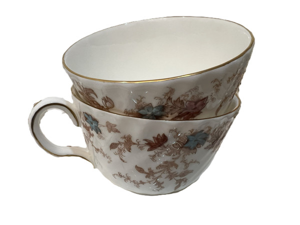 This is a large collection of Minton "Ancestral" bone china dinnerware. The pattern features a rust and teal floral design with scalloped edges and gold trim.