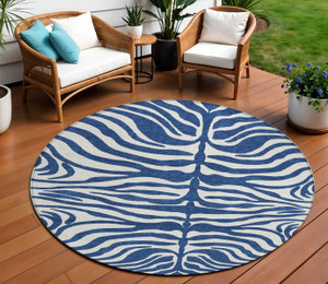 8' Navy Blue And Ivory Round Animal Print Washable Indoor Outdoor Area Rug