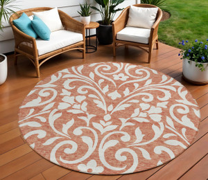 8' Salmon And Ivory Round Floral Washable Indoor Outdoor Area Rug