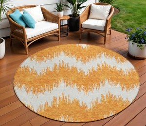 8' Orange And Ivory Round Chevron Washable Indoor Outdoor Area Rug