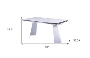 63" White Ceramic and Metal Self-Storing Leaf Pedestal Base Extendable Dining Table
