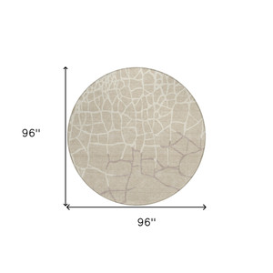 8' Beige And Tan Round Abstract Washable Indoor Outdoor Area Rug