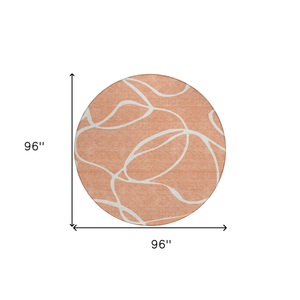 8' Salmon And Ivory Round Abstract Washable Indoor Outdoor Area Rug