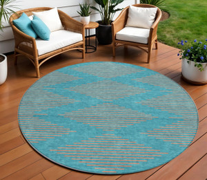 8' Teal Blue And Pink Round Geometric Washable Indoor Outdoor Area Rug