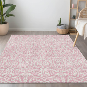 10' X 14' Pink And Ivory Damask Washable Indoor Outdoor Area Rug