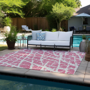 9' X 12' Pink and Ivory Abstract Washable Non Skid Indoor Outdoor Area Rug