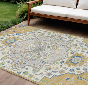 10' X 14' Gold Ivory And Blue Oriental Washable Indoor Outdoor Area Rug