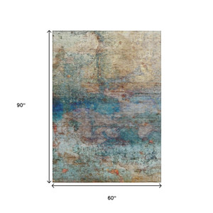 5' X 8' Teal Blue Orange And Beige Abstract Washable Indoor Outdoor Area Rug