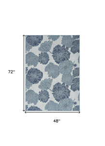 4' X 6' Navy Blue Ivory And Blue Floral Indoor Outdoor Area Rug