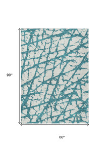 5' X 8' Teal Blue And Ivory Abstract Washable Indoor Outdoor Area Rug - 880016594379