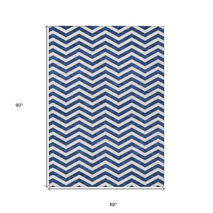 5' X 8' Navy Blue And Ivory Chevron Washable Indoor Outdoor Area Rug