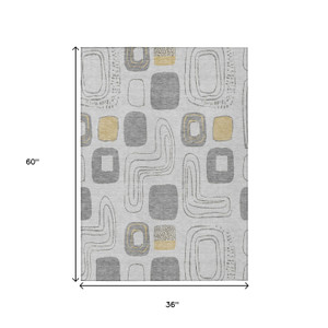 3' X 5' Gray Silver And Gold Geometric Washable Indoor Outdoor Area Rug