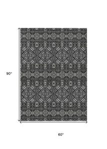 5' X 8' Black And Ivory Tribal Washable Indoor Outdoor Area Rug