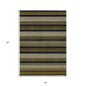 3' X 5' Brown Ivory And Black Striped Washable Indoor Outdoor Area Rug
