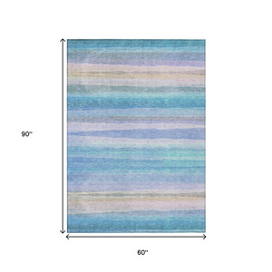 5' X 8' Aqua Lavender And Peach Striped Washable Indoor Outdoor Area Rug