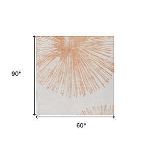 5' X 8' Salmon And Ivory Abstract Washable Indoor Outdoor Area Rug