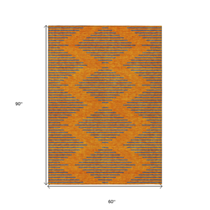5' X 8' Orange And Blue Geometric Washable Indoor Outdoor Area Rug