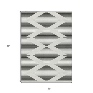 5' X 8' Ivory And Black Geometric Washable Indoor Outdoor Area Rug