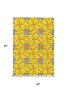 5' X 8' Yellow And Teal Blue Geometric Washable Indoor Outdoor Area Rug