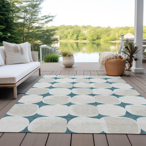 5' X 8' Teal Blue Beige And Ivory Abstract Washable Indoor Outdoor Area Rug