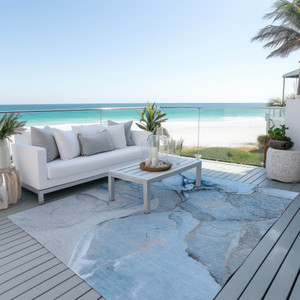 5' X 8' Blue and Ivory Abstract Washable Non Skid Indoor Outdoor Area Rug