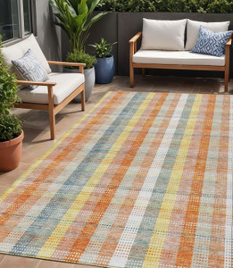 5' X 8' Peach Ivory And Orange Plaid Washable Indoor Outdoor Area Rug