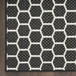 8' Black And Ivory Geometric Indoor Outdoor Runner Rug