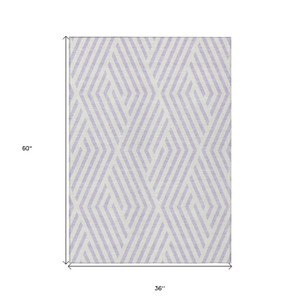 3' X 5' Lavender and Ivory Geometric Washable Non Skid Indoor Outdoor Area Rug