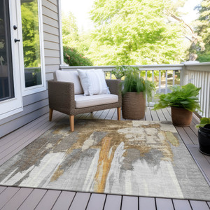 5' X 8' Ivory And Gold Abstract Washable Indoor Outdoor Area Rug