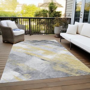 5' X 8' Gold And Gray Striped Washable Indoor Outdoor Area Rug