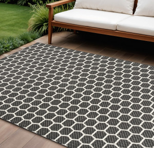 9' X 12' Black And Ivory Geometric Indoor Outdoor Area Rug