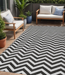 5' X 8' Black And Ivory Chevron Washable Indoor Outdoor Area Rug